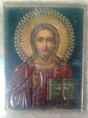 старинную икону и крест